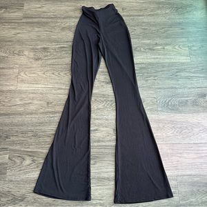 Pretty Little Thing 
Black flare ruched bum slinky